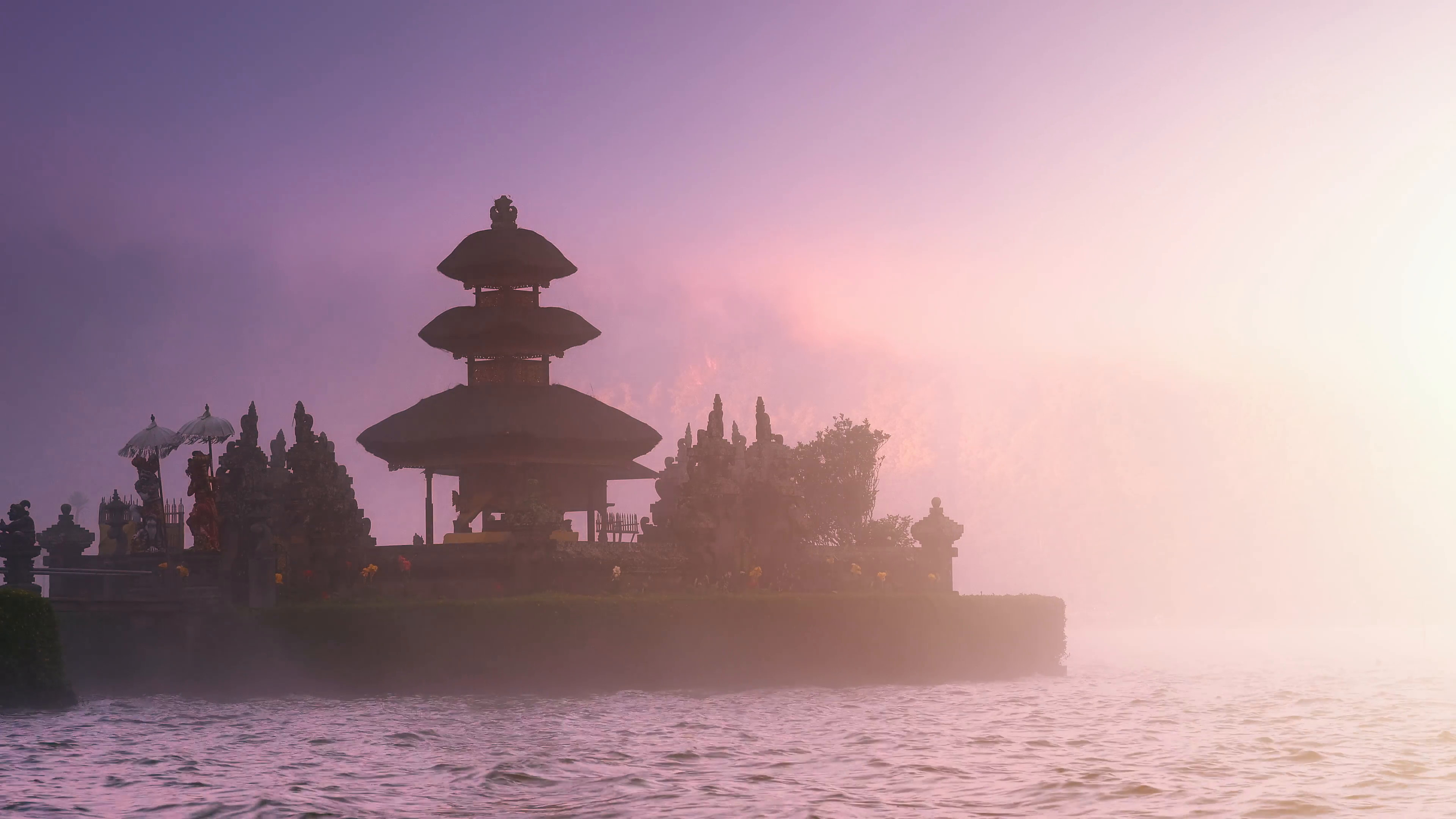 3840x2160 Scenic background of beautiful Bali temple in mist on lake under sunset  sunlight Stock Video Footage - VideoBlocks