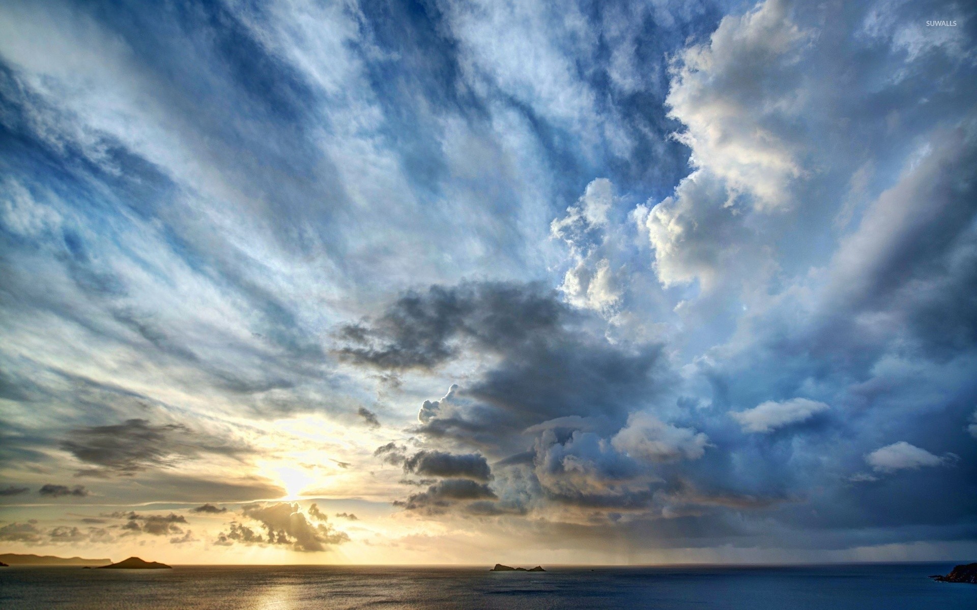 1920x1200 Stormy clouds above the ocean at sunset wallpaper