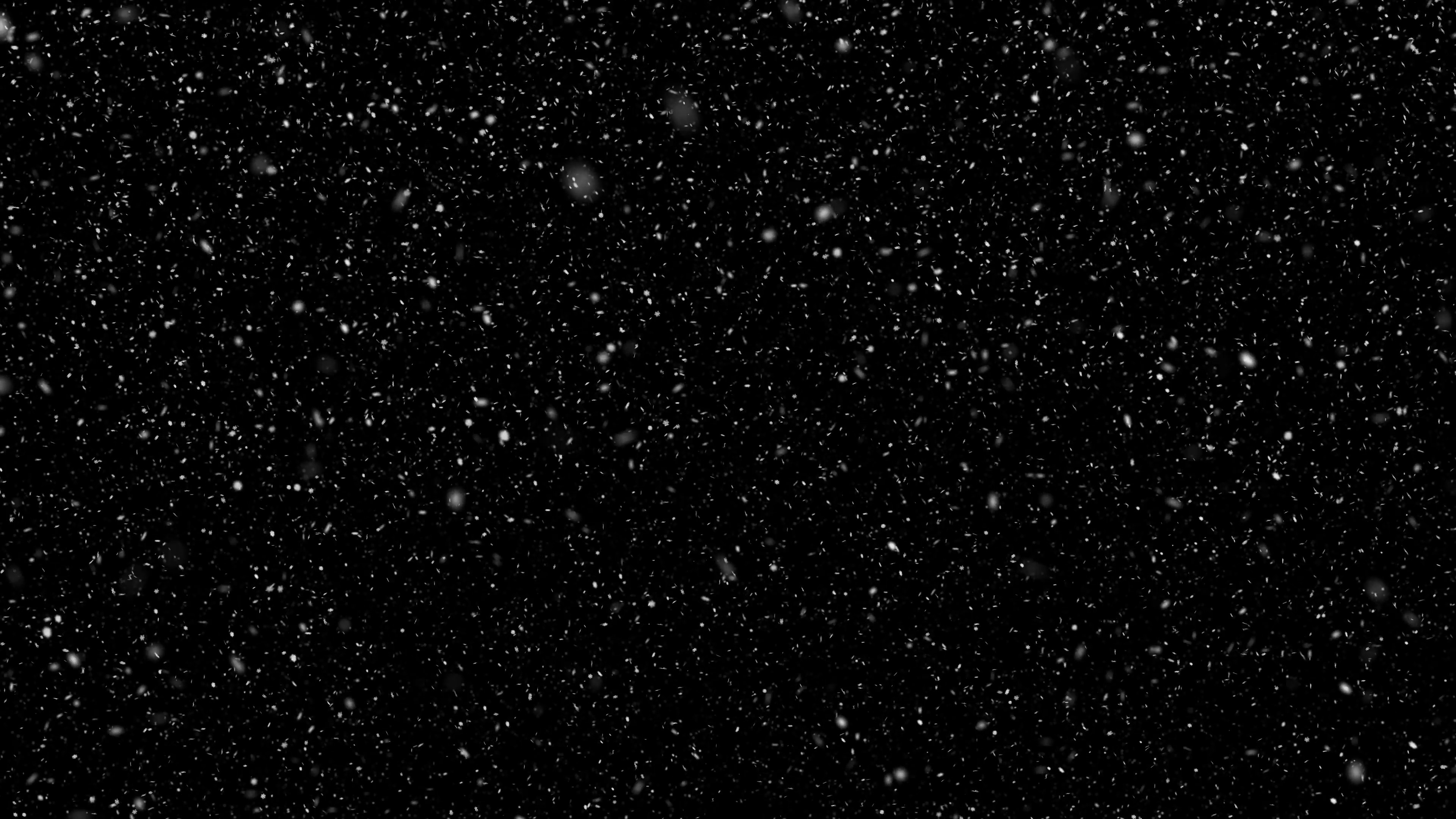 3840x2160 This is realistic animation of detailed very large snow flakes in