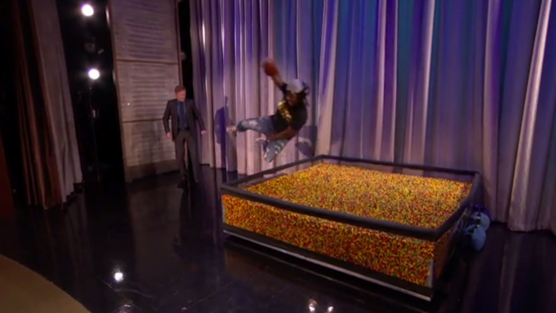1920x1080 Marshawn Lynch dives into an end zone of Skittles on 'Conan' | NFL |  Sporting News