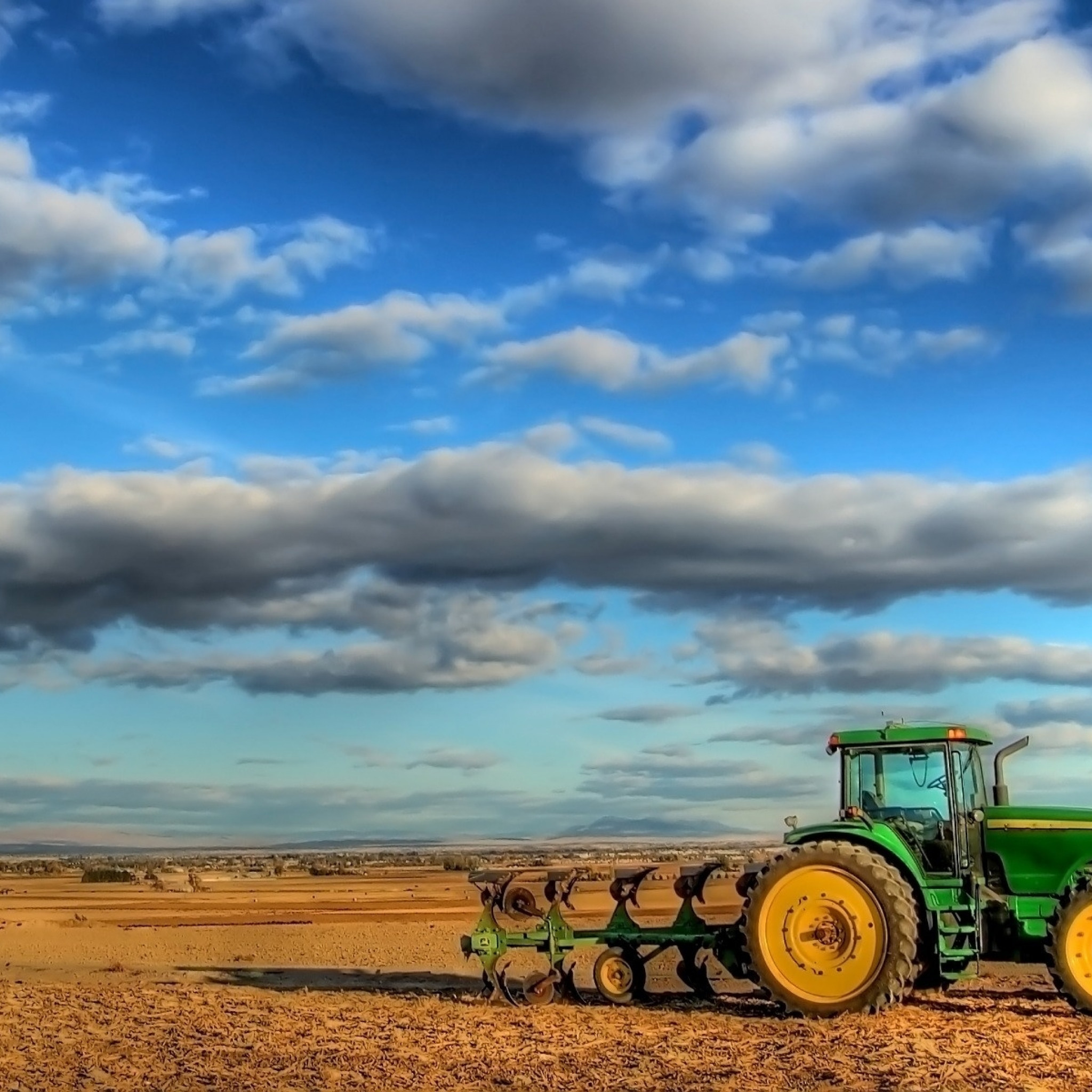 2048x2048  Wallpaper tractor, field, plowing, clouds, agriculture