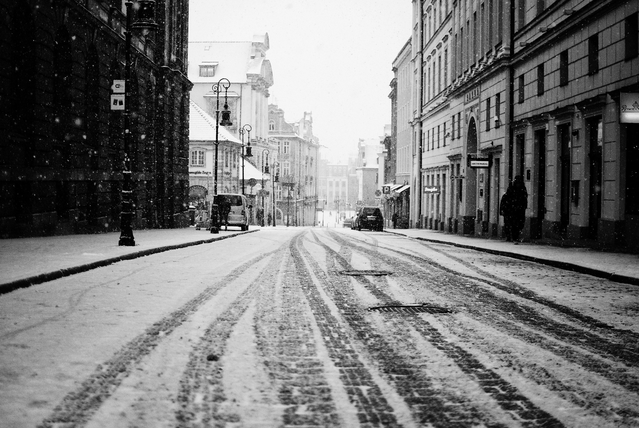 2048x1371 city road snow street buildings houses people cars tracks winter black  white wallpaper