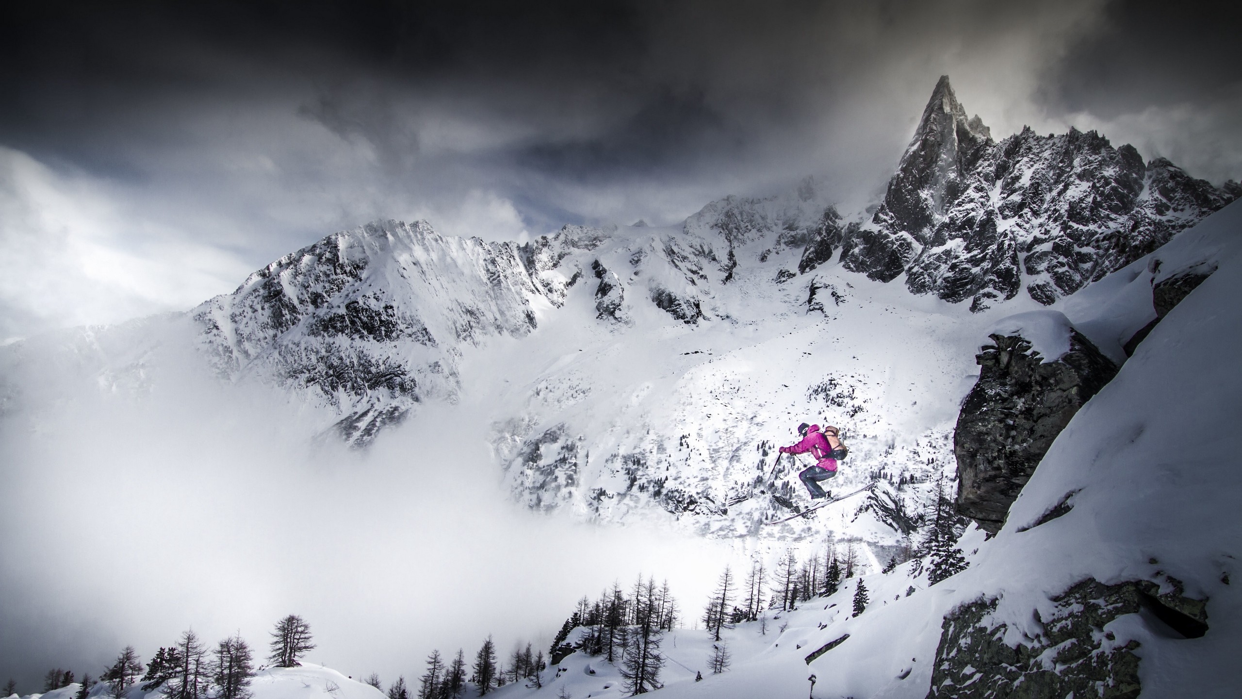 2560x1440  Wallpaper skiing, skier, jump, mountains, snow