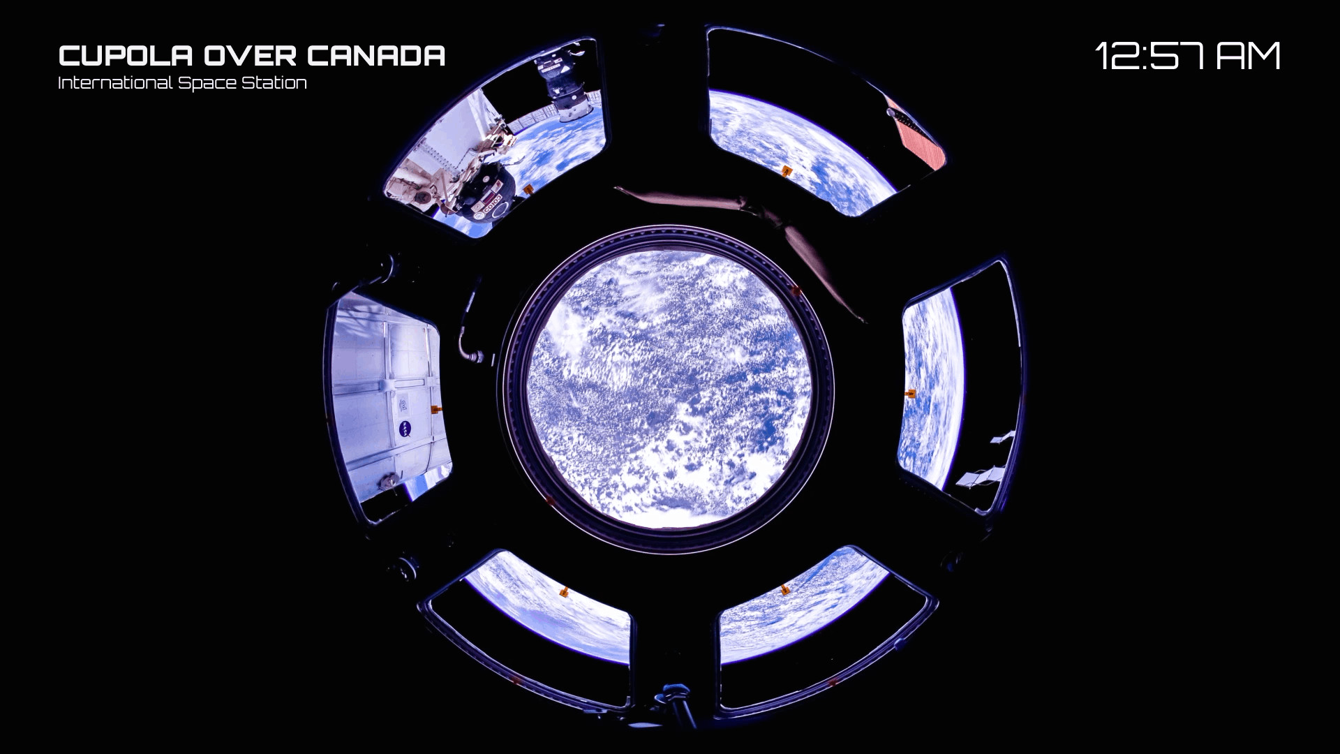 1920x1080 Canada through the ISS cupola window.