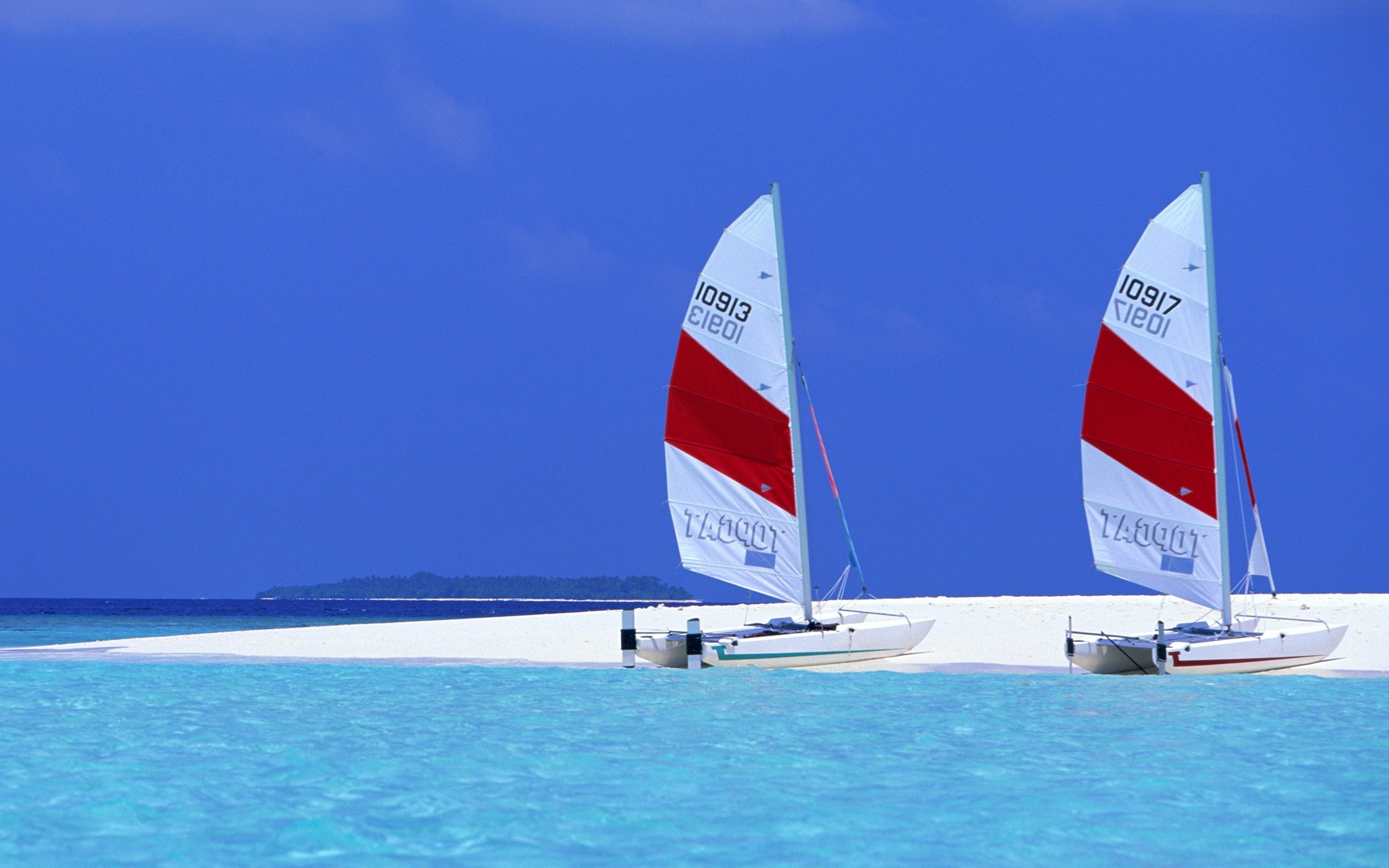 2560x1600 Sailing Boats on Exotic Beach wallpapers and stock photos