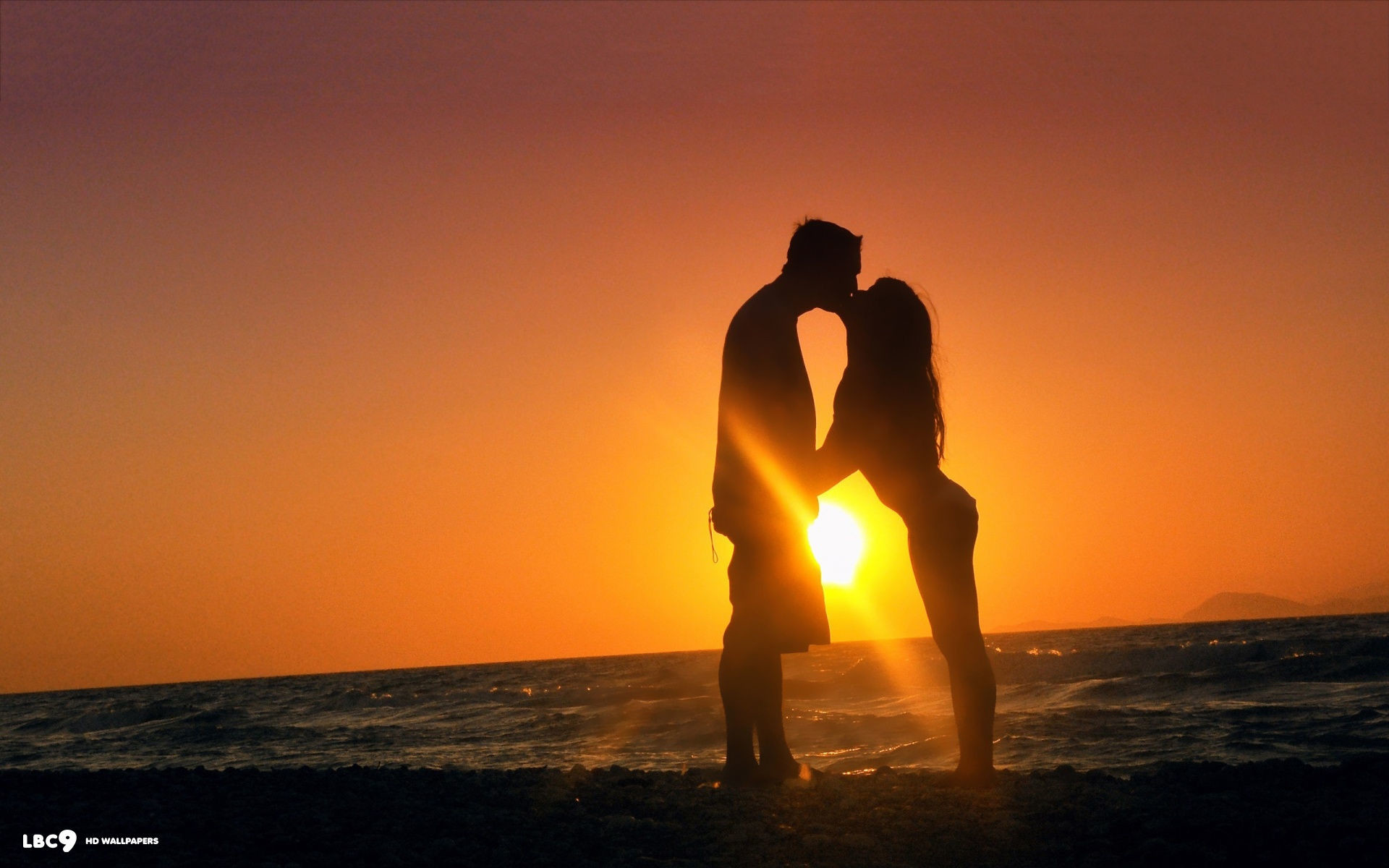 1920x1200 romantic kiss sunset sun sea cute couple scenery silhouette hd wallpaper
