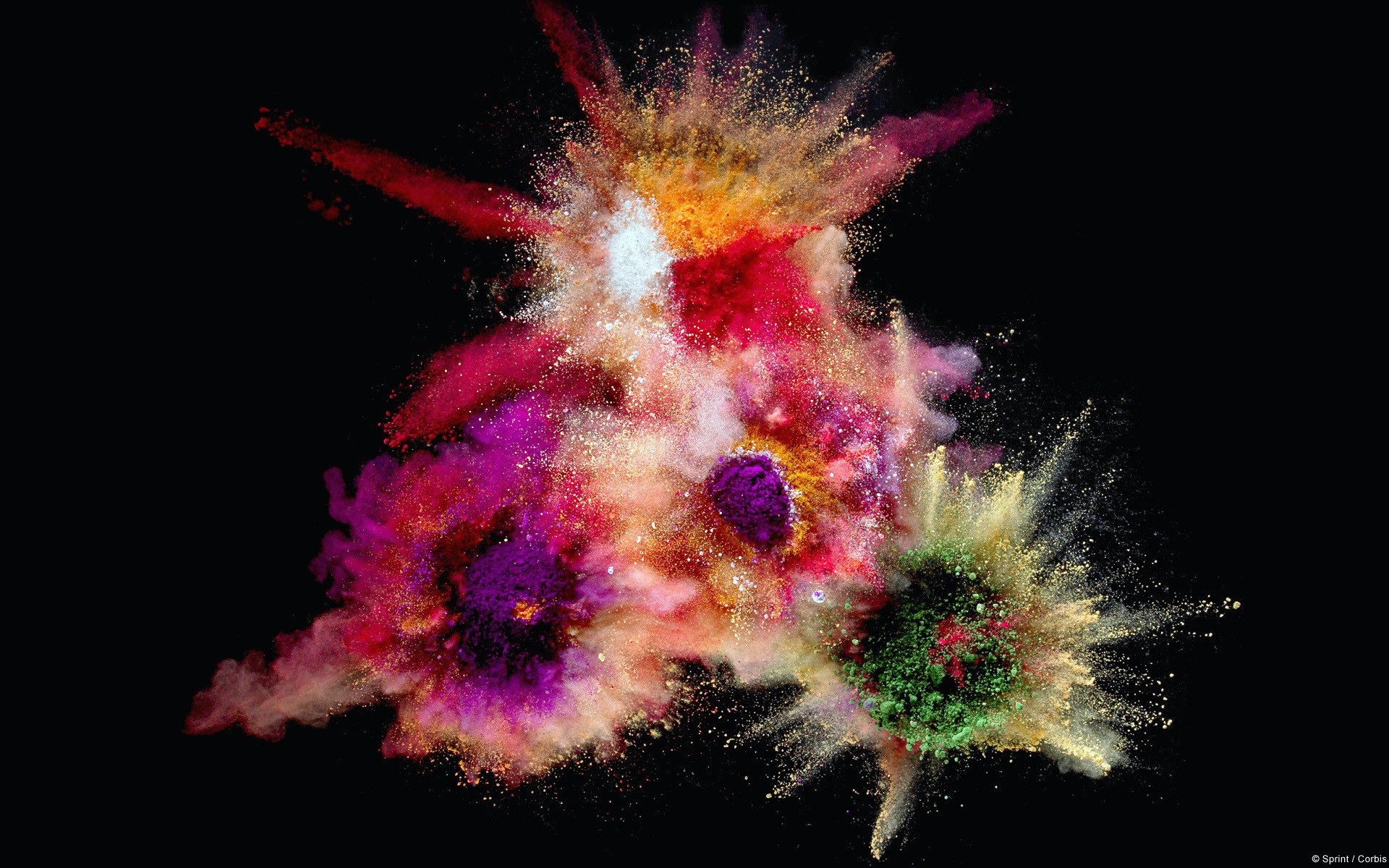 1920x1200 Close-up of colorful powder splashing against black background