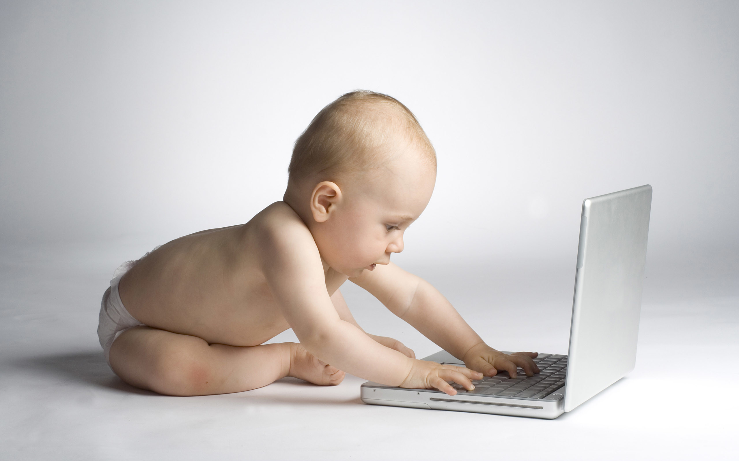 2560x1600 Baby with laptop wallpaper