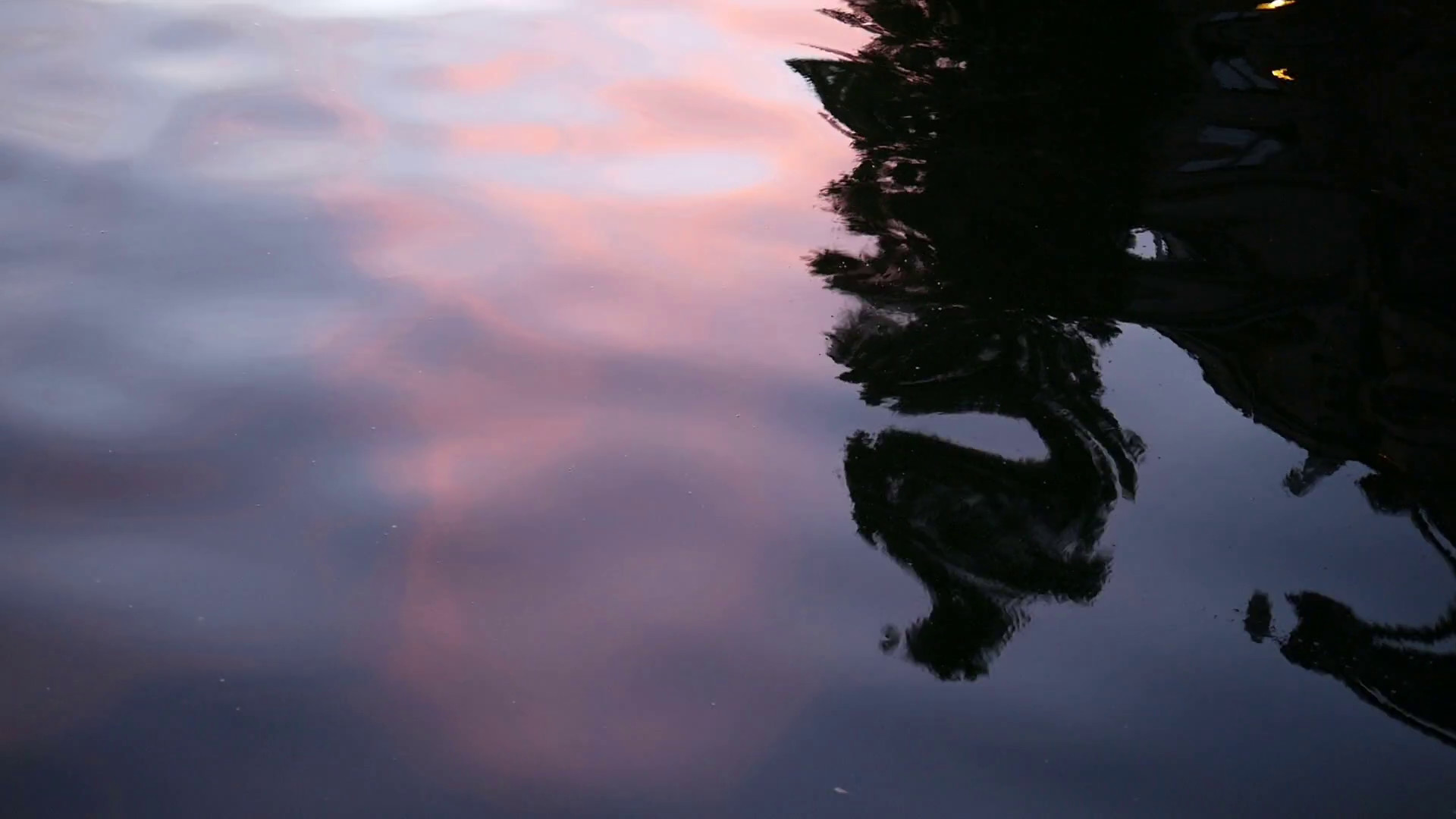 1920x1080 Slow Motion close-up calm water surface reflections at dusk background. Sky  and tree reflected Stock Video Footage - VideoBlocks
