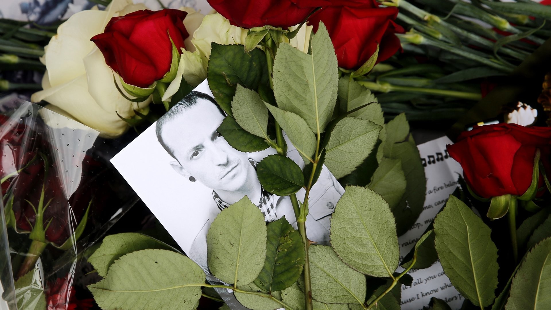 1920x1080 Red roses and a picture of Linkin Park frontman Chester Bennington were  laid in front of the US embassy in central Moscow, Russia, on July 22, 2017.