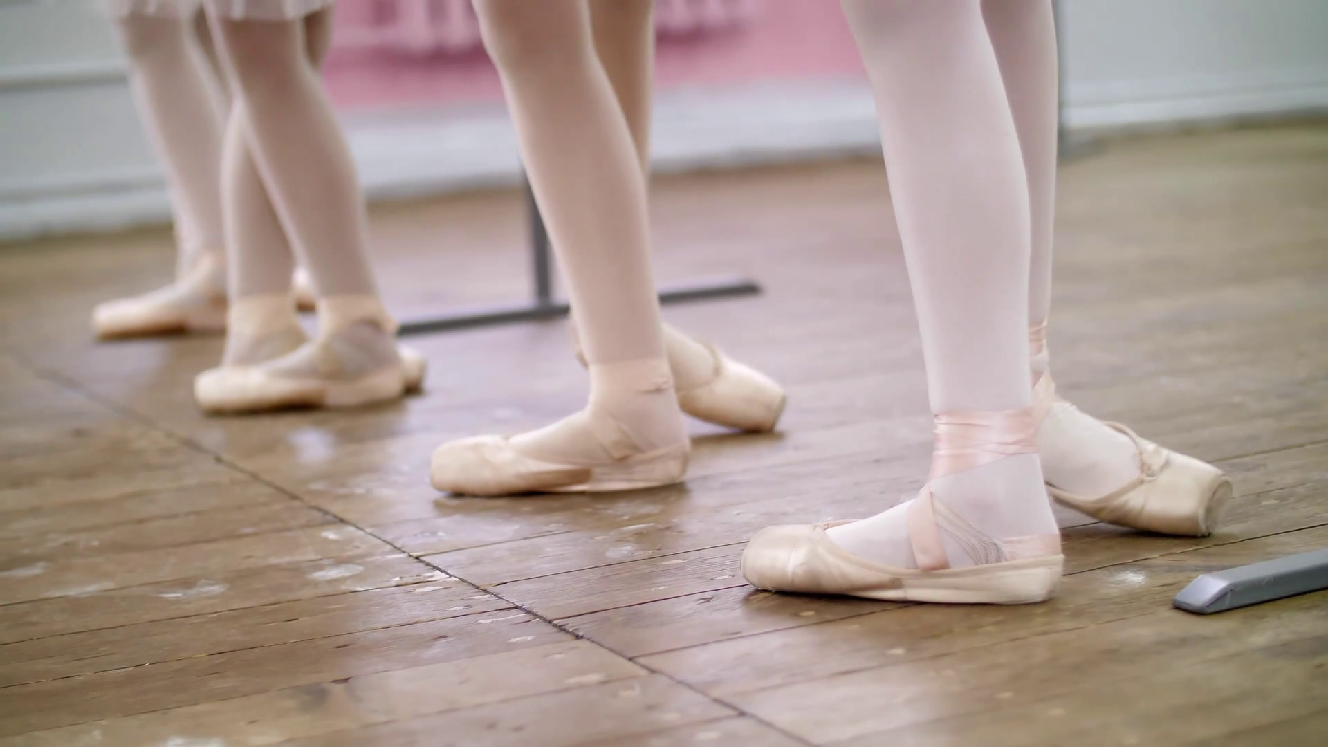1920x1080 in ballet hall, Young ballerinas perform battement tendue back in pointe  shoes, close-up Stock Video Footage - Storyblocks Video