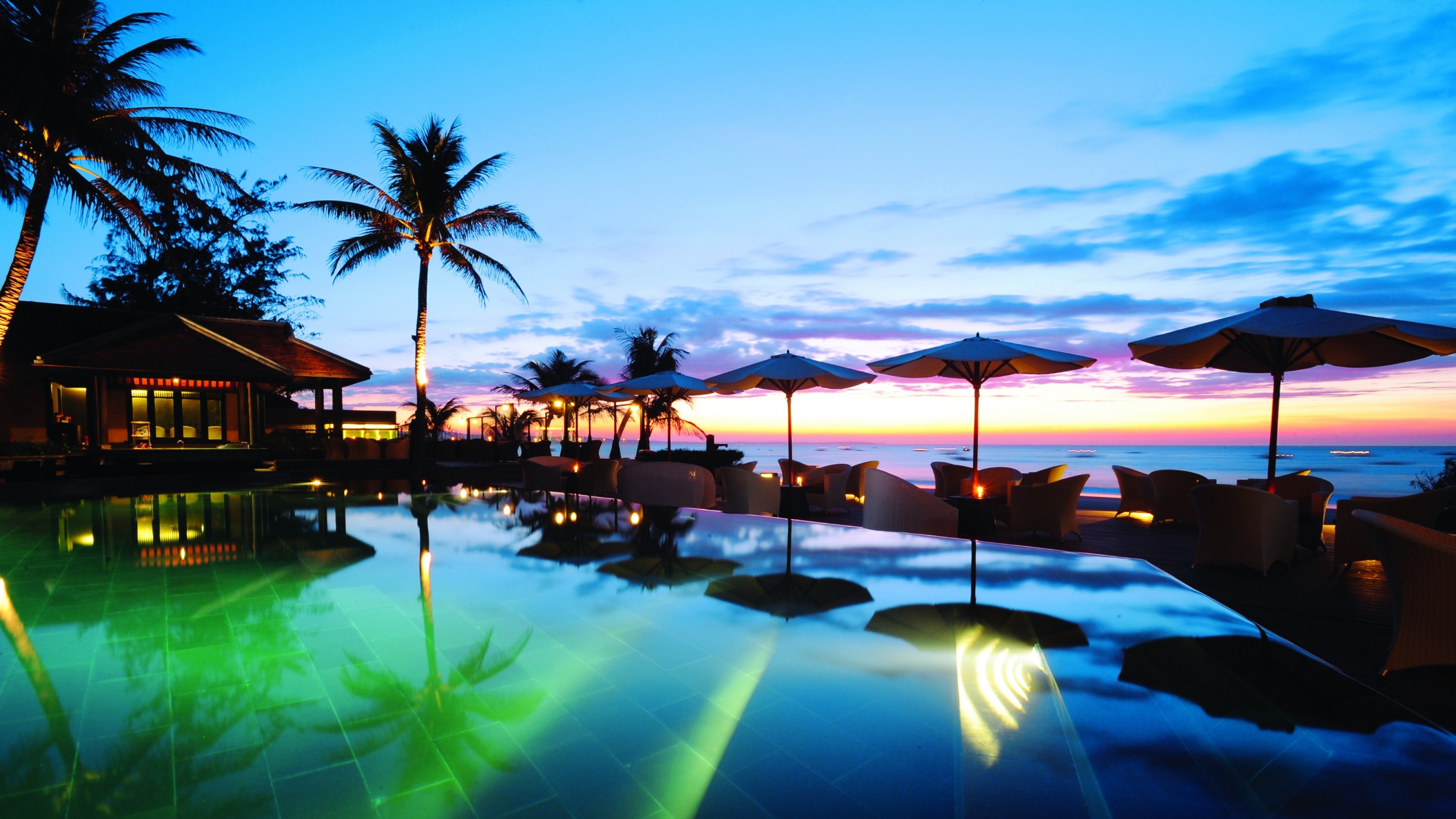 3840x2160  Wallpaper tropics, sea, palm trees, evening, sunset