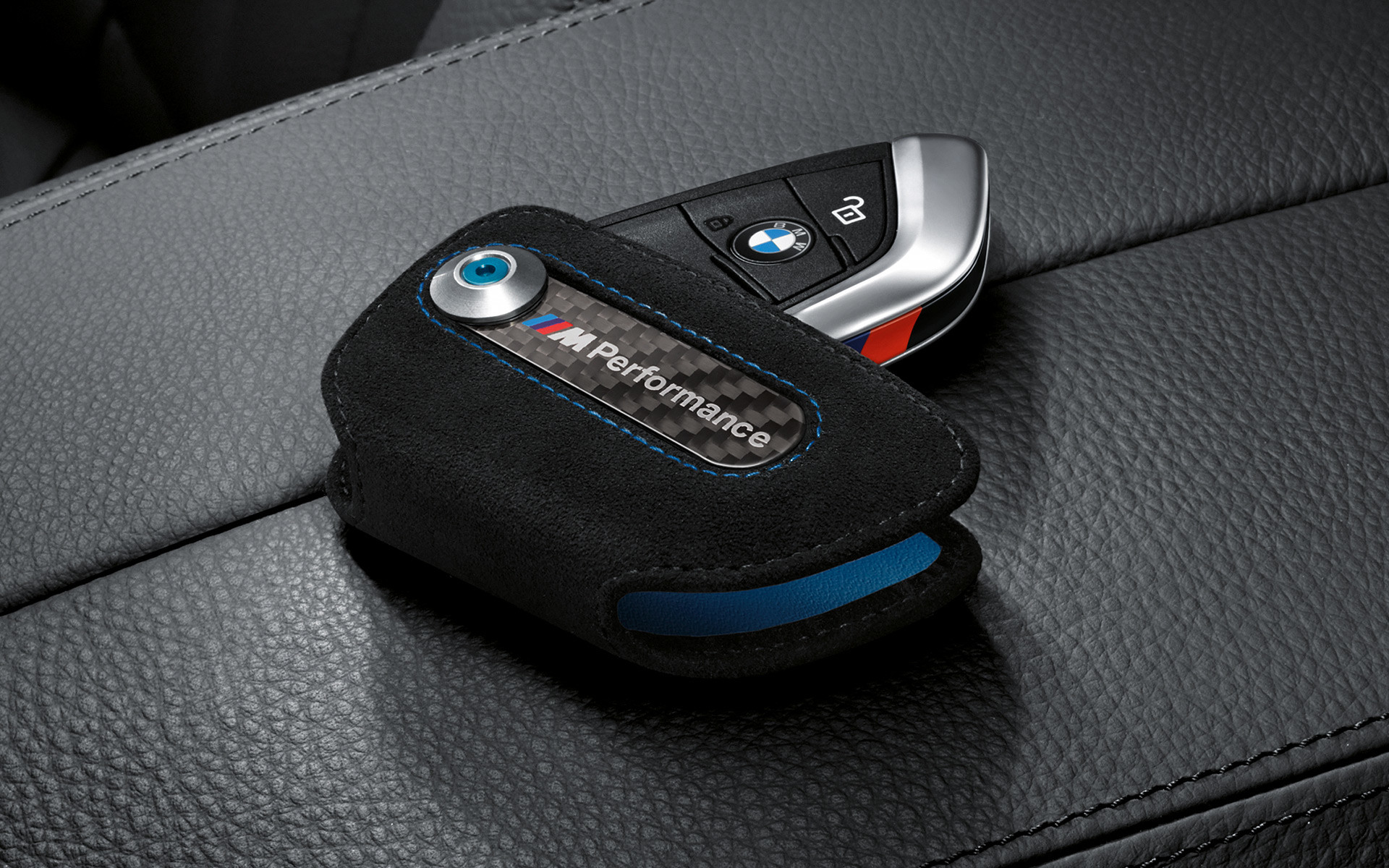 1920x1200 Protects and displays the racing sport passion: BMW M Performance door key  case out of Alcantara.