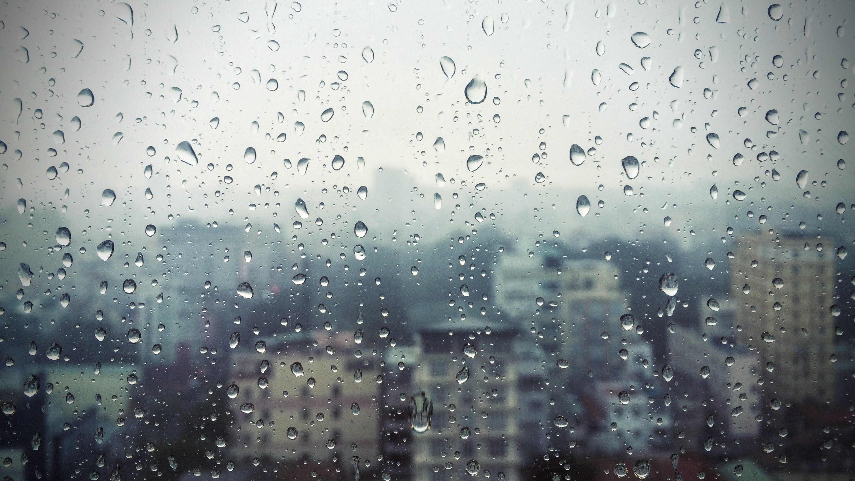 3264x1835  Wallpaper rain, window, glass, buildings, drops