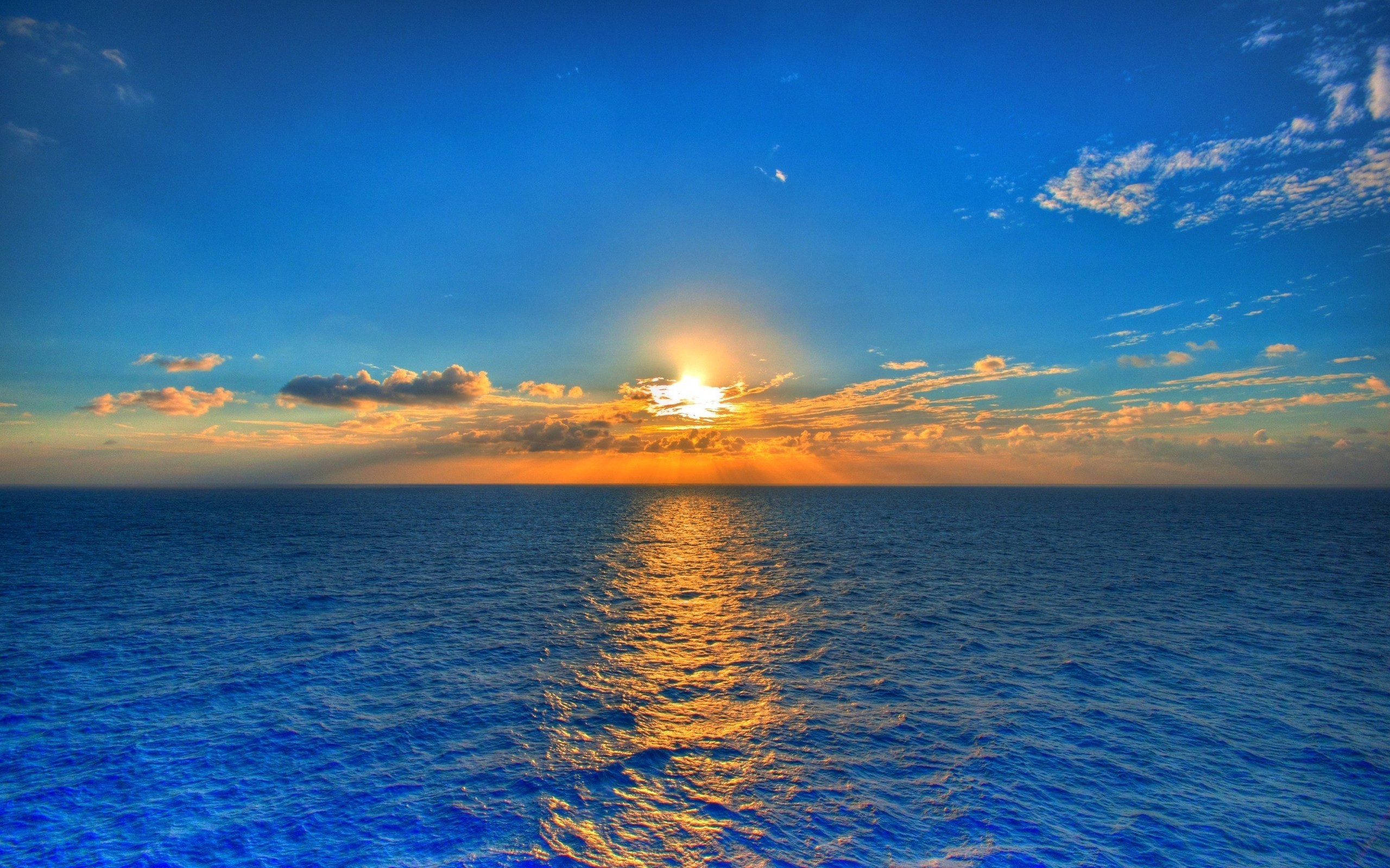 2560x1600 Sunset On Blue Sea Water